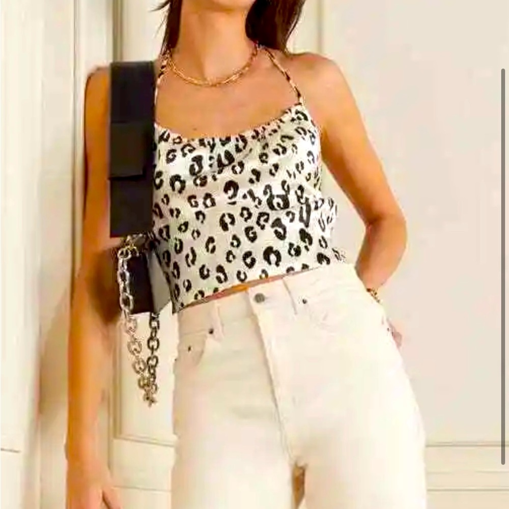 Reformation silk snow leopard top in xs. Worn once and in excellent condition.